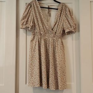 Flowy print dress w/puff ruffle sleeves, open back w/ tie detail